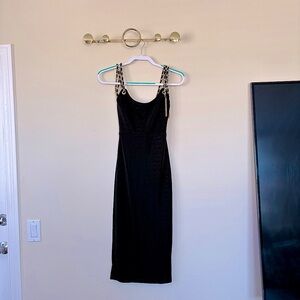FASHIONOVA Black Dress with Gold Chain Accents